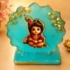 Baby krishna turquoise Resin Decorative Table /Car Stand( turquoise blue with golden accents)