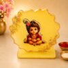 Baby krishna Golden Acrylic Decorative Table/ Car stand (Golden yellow/ Mustard yellow